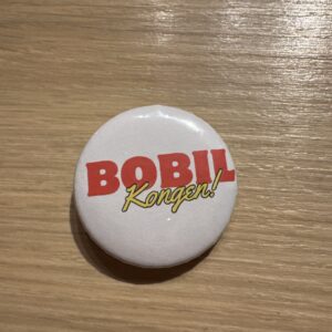 Bobil kongen button