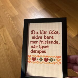 Postkort om aldring i ramme