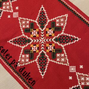 Redesignet juleduk, geriljabroderi