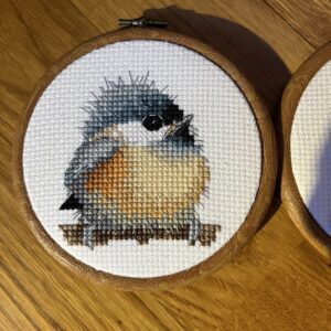 Detalj av første meis-broderi